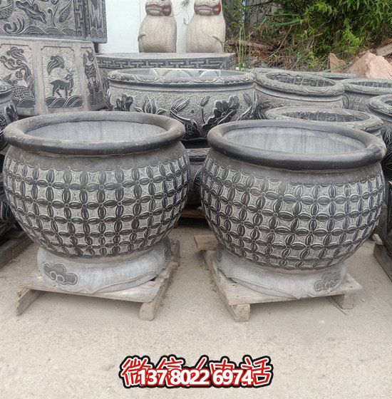 自然美學(xué)結(jié)合青石石雕、浮雕、編織、雕塑的戶外園林魚缸